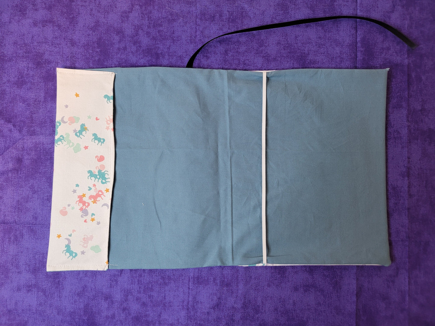 Blue unicorn adjustable book sleeve