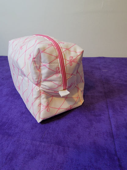 Oopsie - Large pink and white bows quilted bag